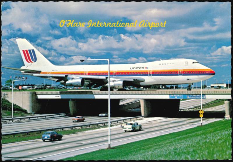 United Airlines Jumbo Jet Taxiing Across Expressway Chicago Illinois