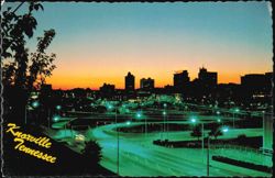 Skyline at Sunset with Highway Interchange Postcard
