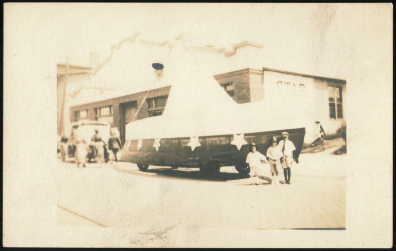 Parade Float Shaped Like a Boat with Stars Transportation