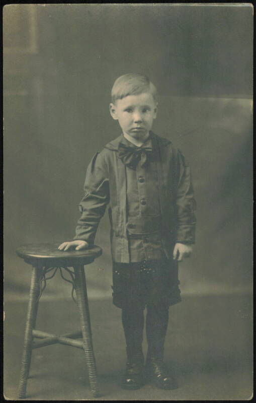 Young Boy in Suit with Bow Tie Children