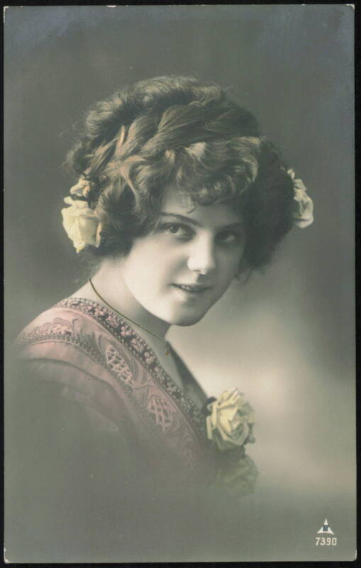 Young Woman with Roses in Hair and Dress Women