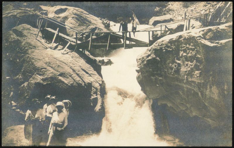 Harmon Falls People at a Waterfall with Wooden Bridge Eldorado Springs Colorado