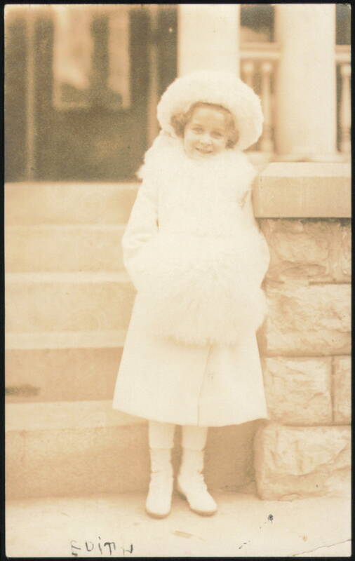 Young Girl in White Fur Hat and Coat Children