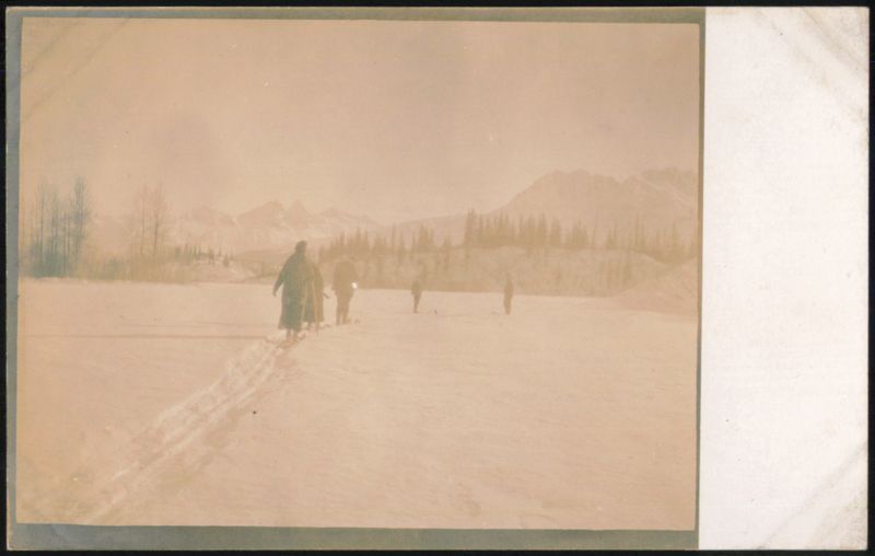 Skiers in Snowy Mountain Landscape Skiing
