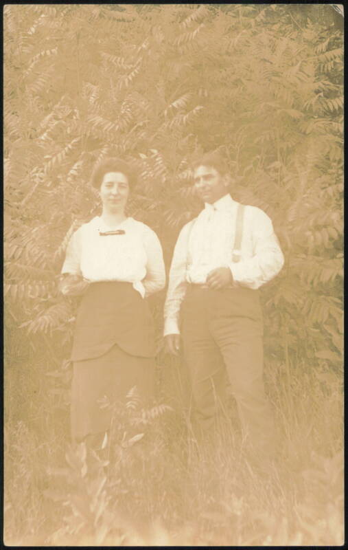 Man and Woman Posing in Foliage Couples