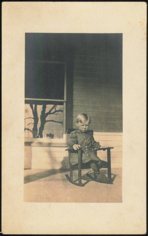 Child in Rocking Chair on Porch Babies