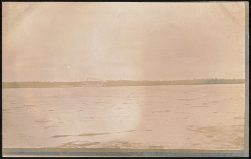 Paddle Steamer on River with Forested Bank Transportation
