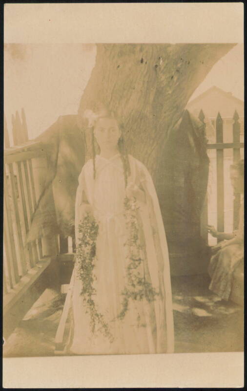 Young Woman in White Dress with Garlands Women