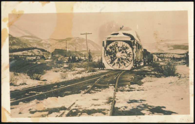 Rotary Snowplow Train in Snowy Mountains Transportation