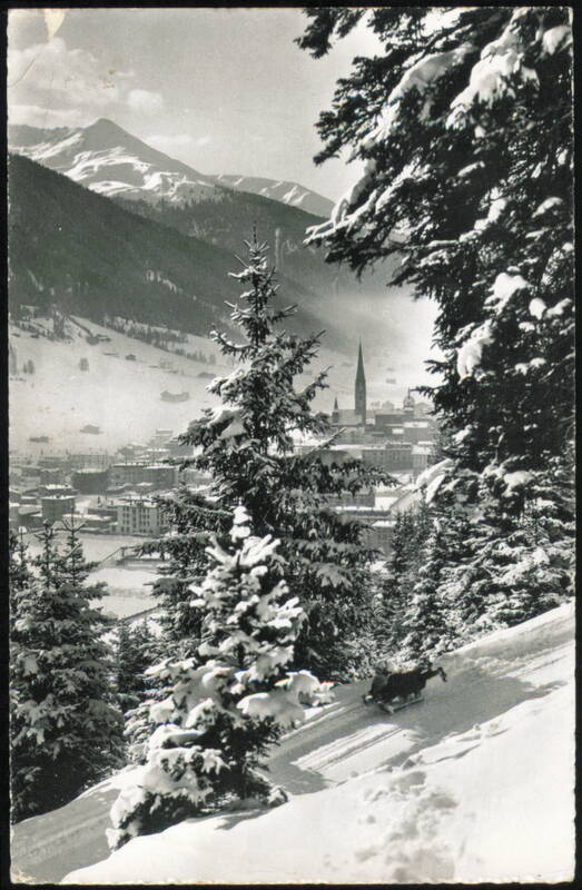 Skiing in Snowy Mountains with Town View Davos Switzerland