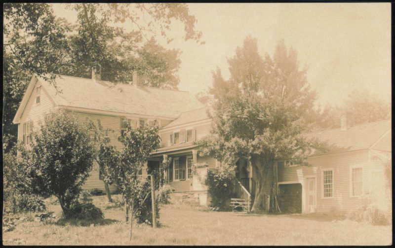Large Two-Story House with Attached Barn Buildings