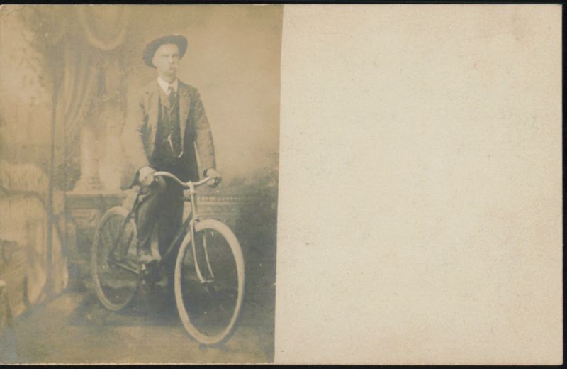 Man in Hat with Bicycle Bicycles