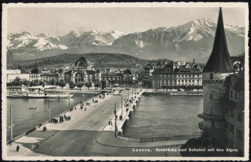 Luzern Lake Bridge, Train Station with Alps Switzerland