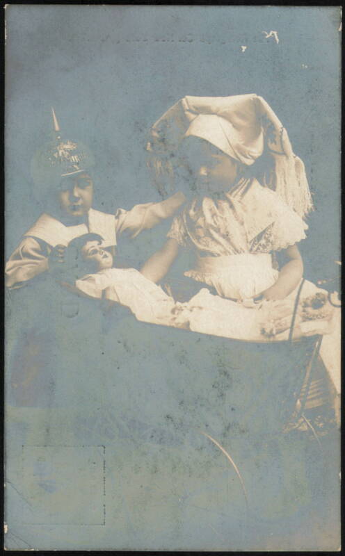Children in Spiked Helmet & Bonnet with Doll