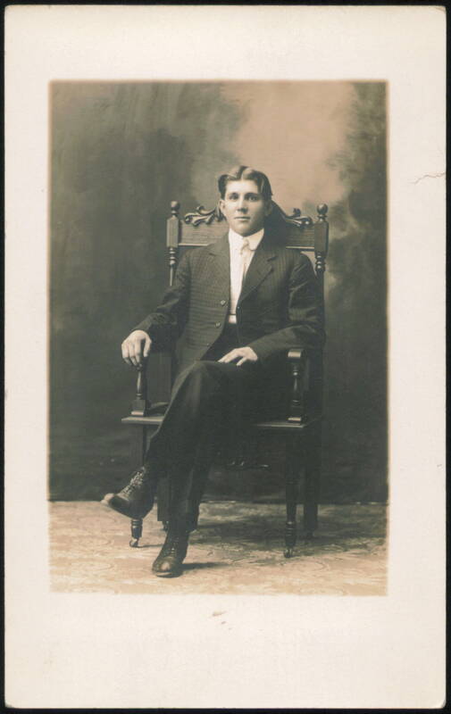 Young Man in Suit Studio Portrait Men