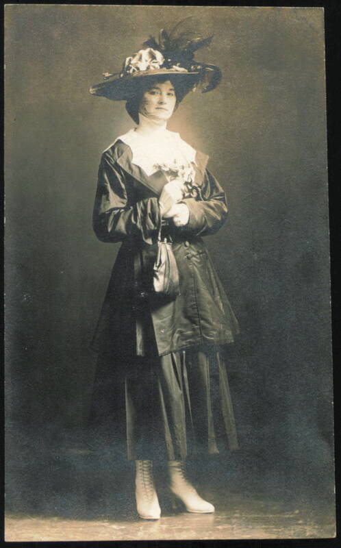Woman in Large Hat, Coat, and Skirt with Purse Women