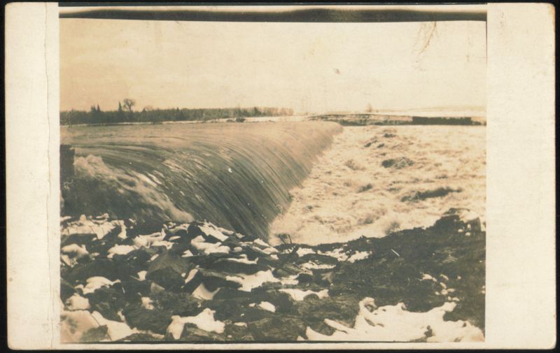 Water Flowing Over a Dam Landscapes