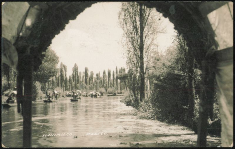 Xochimilco Canal with Boats and Trees Mexico