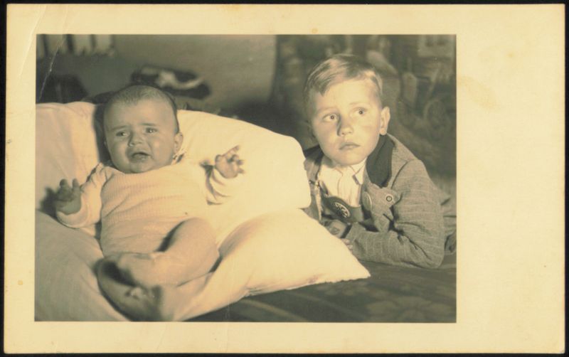 Two Boys, Baby Crying, Older Boy Watching Stuttgart Germany