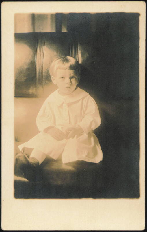 Young Boy in White Collared Outfit Children