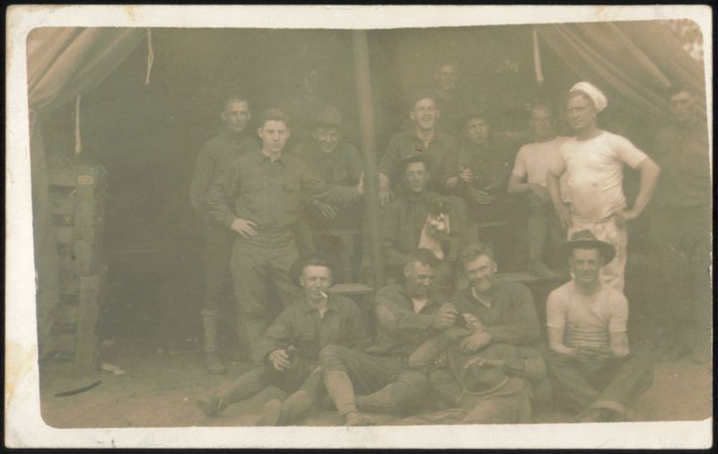 Soldiers in Camp, One with Chef's Hat World War I