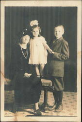Woman, Two Children Studio Portrait Postcard