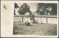 Woman & Child Sitting in Backyard Postcard