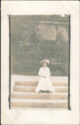 Woman in White Dress & Floral Hat on Steps Postcard
