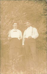 Man and Woman Posing in Foliage Postcard