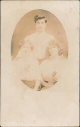 Three People Portrait, Man & Two Women Postcard