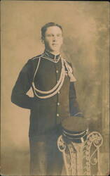 Young Man in Uniform with Braided Cord and Medal Postcard