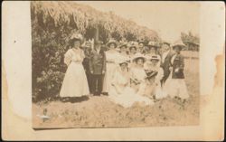 Group of Women & Men in Garden, Early 1900s Postcard