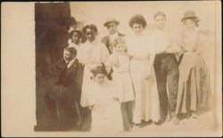 Group Portrait of Nine People, Solio Real Photo Postcard