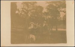 Man & Woman Posing with Cannon, Outdoor Scene Postcard