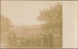 Group of Children Outdoors with Trees and Valley Postcard