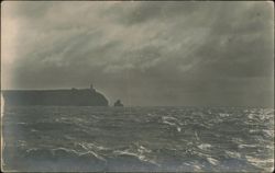 Stormy Sea, Lighthouse on Cliff Postcard