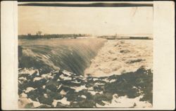 Water Flowing Over a Dam Postcard
