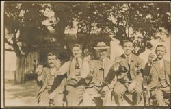 Five Men Toasting with Drinks Outdoors Postcard