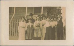 Group Portrait of 10 People in Front of House Postcard