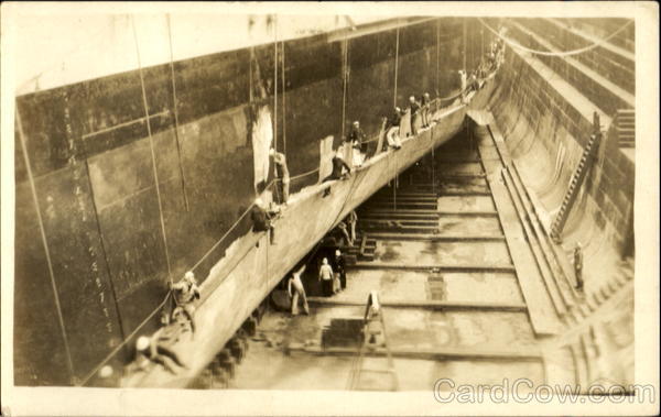 Scraping Hull in Dry Dock Navy