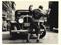 Photo shows a young boy being hit by an auto 1938 Postcard