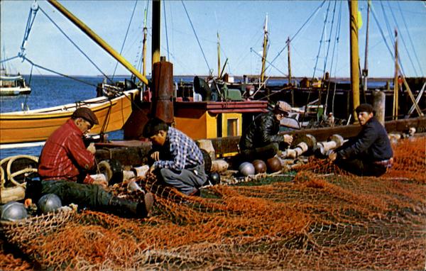Hardy Bay Chaleur Fishermen Working On Their Nets NB Canada