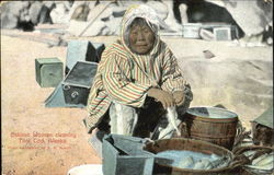 Eskimo Woman Cleaning Tom Cod Postcard