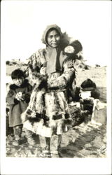 Eskimo Natives Postcard