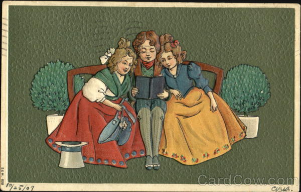 A boy sitting between two little girls reading Children