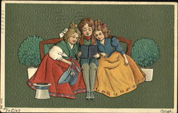 A boy sitting between two little girls reading Postcard
