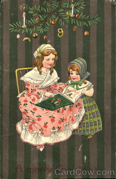 Two girls reading a book Children