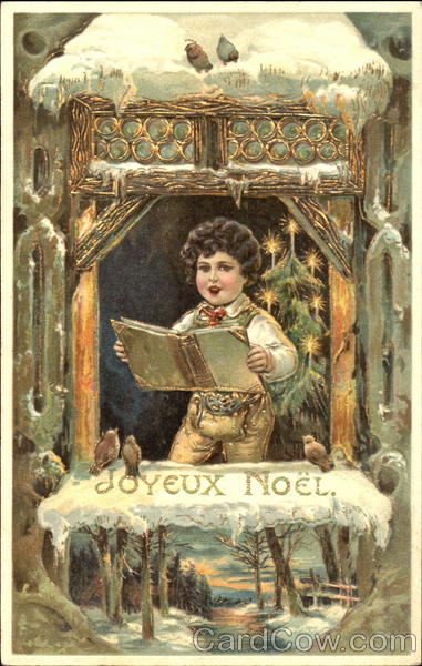 Boy singing Christmas carols Children