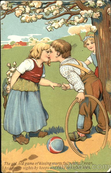 boy kissing a girl on a grassy hillside Romance & Love
