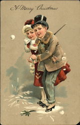 Young couple throwing snowballs Postcard